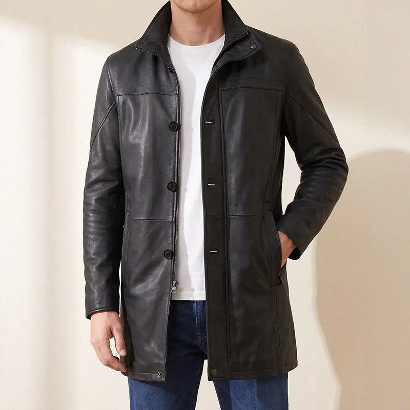 Man in a black real leather car coat over a white tee